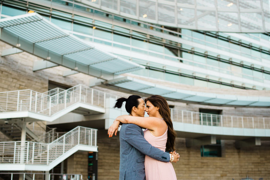 Hugging Couple with the San Jose Civic Hall as a background