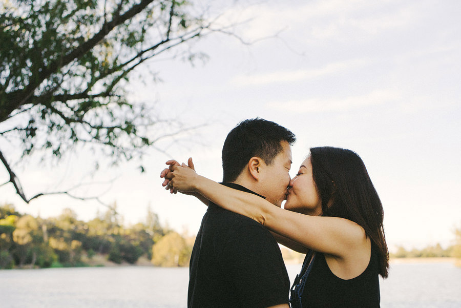 A cute picture of a girl kissing her fiance