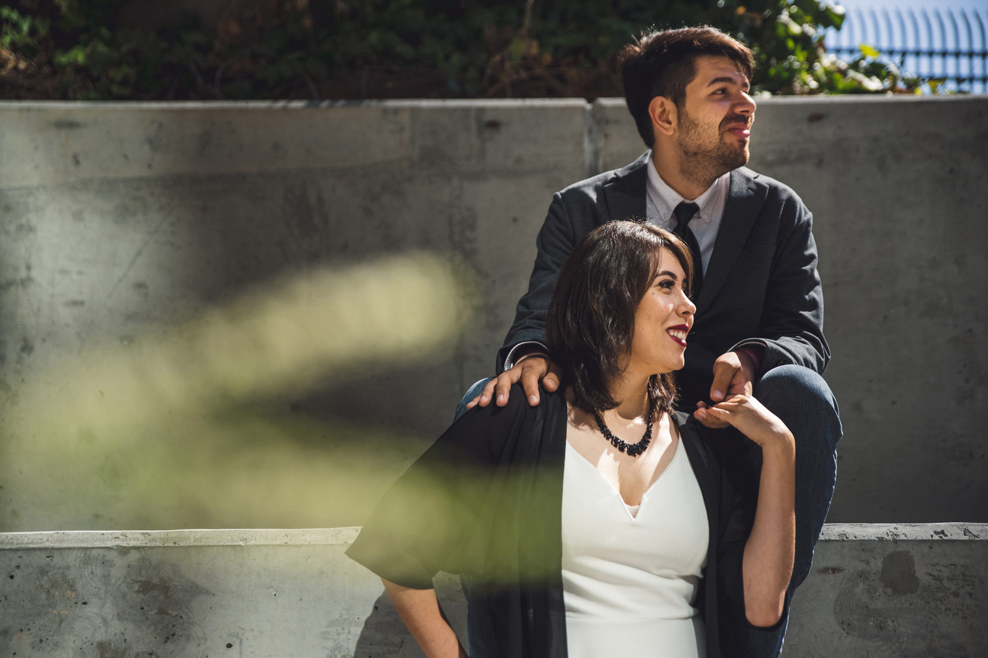A Wedding couple posed at the San Jose Clerk Recording Office backyard