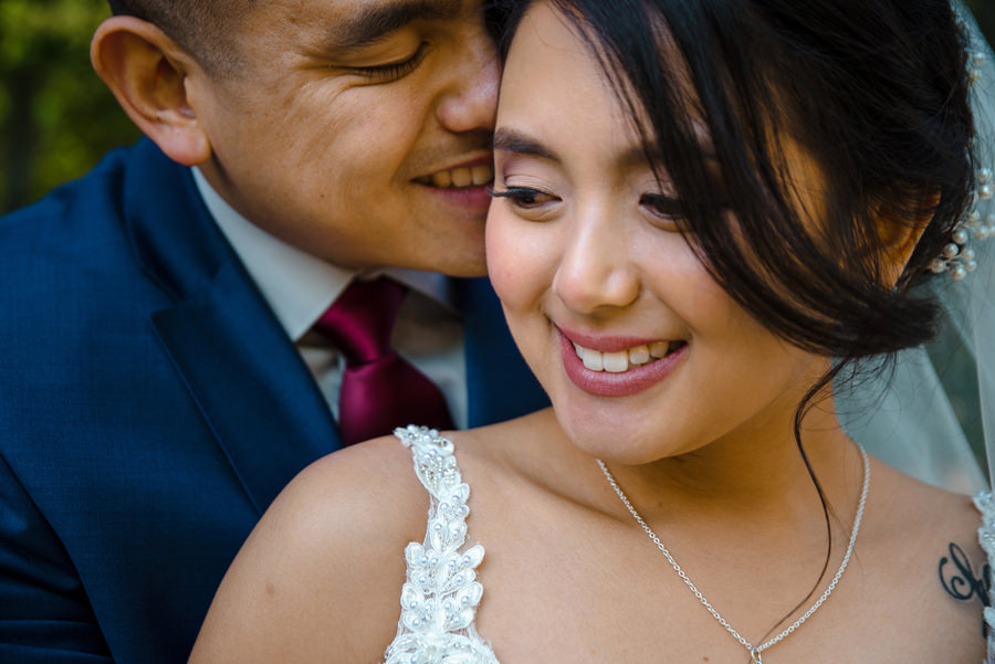 A close up picture of a wedding couple
