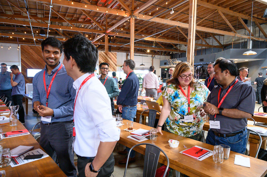 Conference attendees greet each other at Forager Tasting Room in downtown San Jose