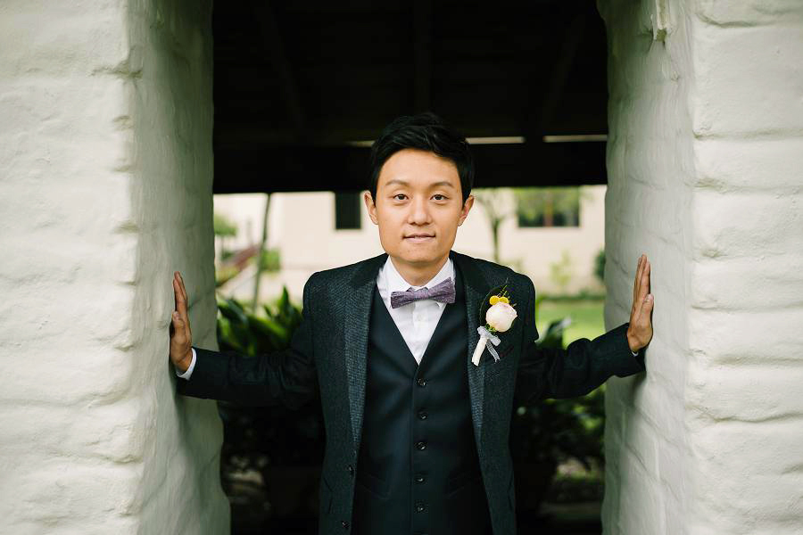 A cool picture of a groom during his Wedding portrait session