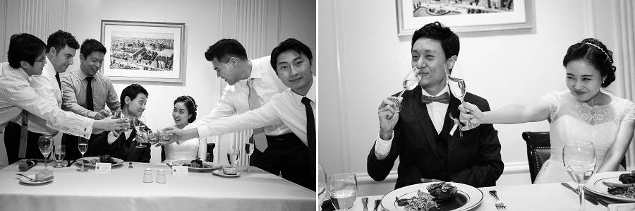 A newly wed being toasted at the reception by their friends