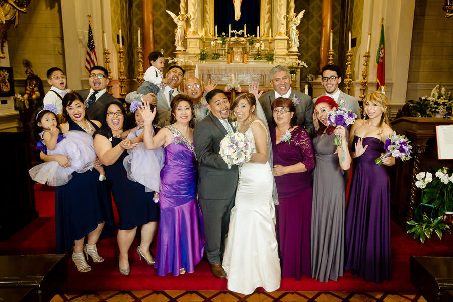 A cute formal picture of the Wedding Family on the altar