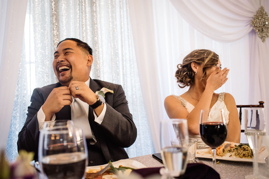 An laughing couple got toasted during the speech