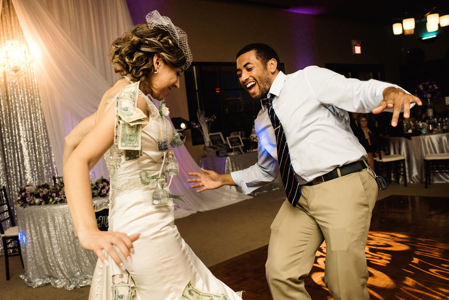 Bride dances with a Guest doing some funky routine